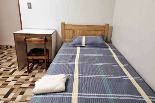 Ένα ή περισσότερα κρεβάτια σε δωμάτιο στο Apartamento amplio y acogedor