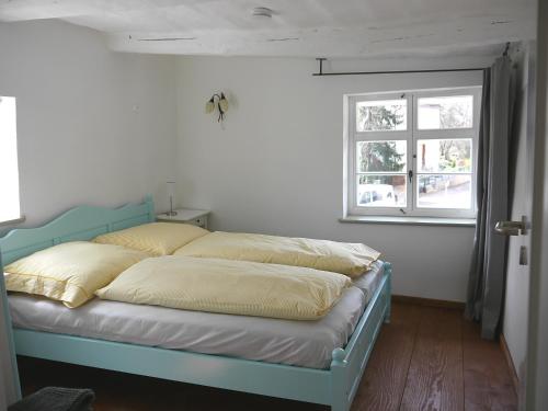 Säng eller sängar i ett rum på Brunottescher Hof