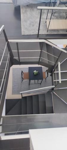 an overhead view of a bench in a building at La Cueva del Sacristán in Luanco