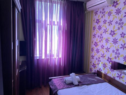 Ένα ή περισσότερα κρεβάτια σε δωμάτιο στο Kapana Plovdiv