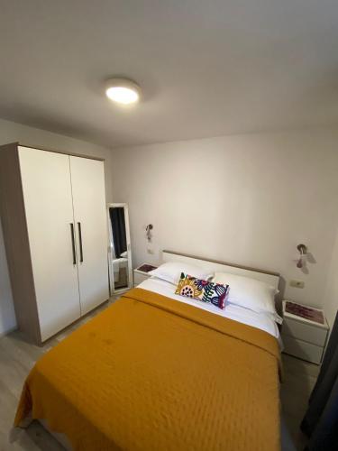 Postel nebo postele na pokoji v ubytování Apartmani Roko