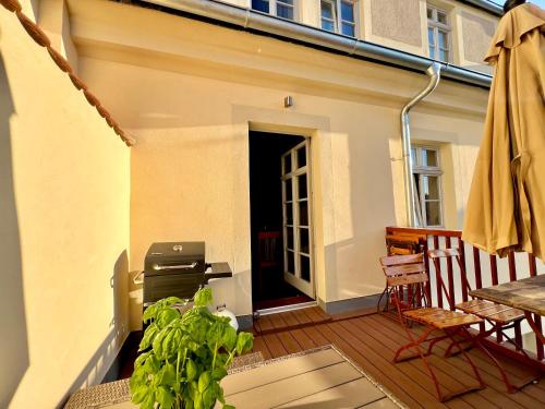 Balkón nebo terasa v ubytování Oswald Hempel 5 Zimmermaisonette und 3 Zimmer Loftwohnung