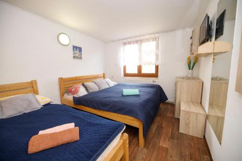 Postel nebo postele na pokoji v ubytování Rendezvous