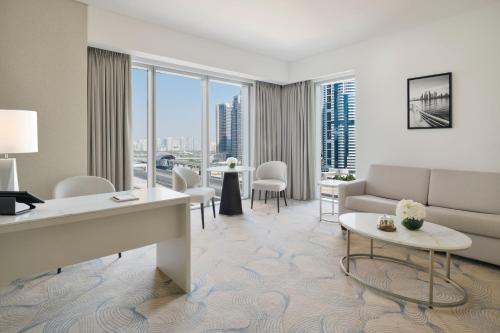 a living room with a couch and a table at JW Marriott Hotel Marina in Dubai