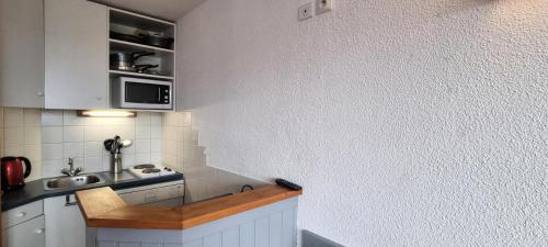 Photo de la galerie de l'établissement Résidence Diamant - Studio pour 4 Personnes 244, à Aime La Plagne