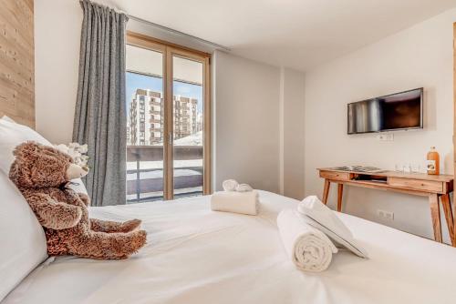 Кровать или кровати в номере Résidence Les Rives - Appartement rénové - 82m2 - 8 personnes MAE-7304