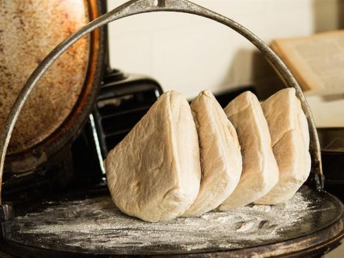 a group of loaves of bread in a basket at Blackwell House in Banbridge