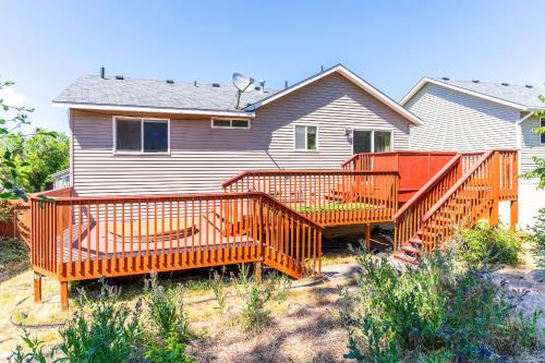 a house with orange stairs in front of it at Spacious home, gameroom, 9mi GEG, 5mi downtown, 5mi to hospitals, close to all universities in Spokane Valley