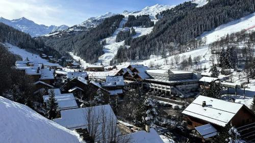 Photo de la galerie de l'établissement Résidence L'ermitage - Appartement 3 pièces mezzanine pour 6 personnes situé à Méribel centre proche des commerces et des pistes de ski MAE-7944, à Les Allues