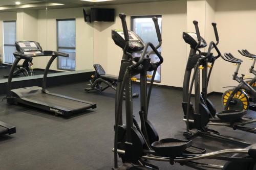 a gym with several exercise bikes and tread machines at City Express Plus by Marriott Puerto Vallarta in Puerto Vallarta
