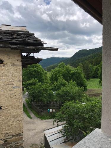 a window of a building with a view of a valley at Cicapuy in Puys