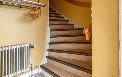 a staircase in a house with a radiator at App, 1 in Edet