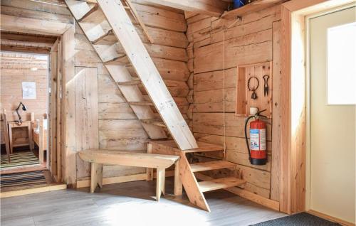 a wooden wall with a ladder and a bench in a room at Pet Friendly Home In Evanger in Evanger