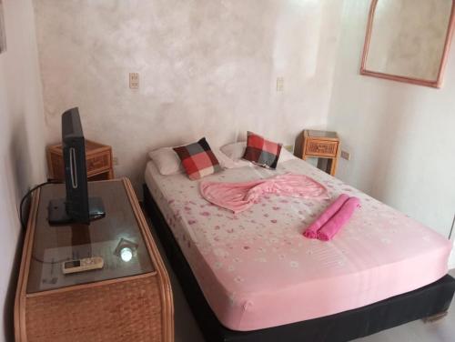 Postel nebo postele na pokoji v ubytování Casa el Pozo Playa el Agua