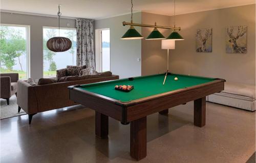a living room with a pool table in it at Lovely Home In Skillingaryd With Sauna in Skillingaryd