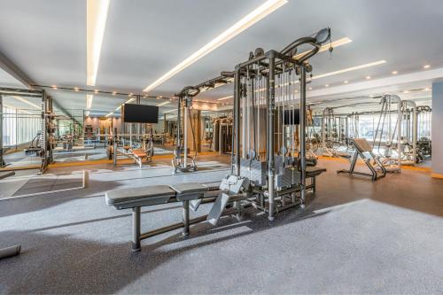 a fitness room with a gym with machines at Four Points by Sheraton Al Ain in Al Ain