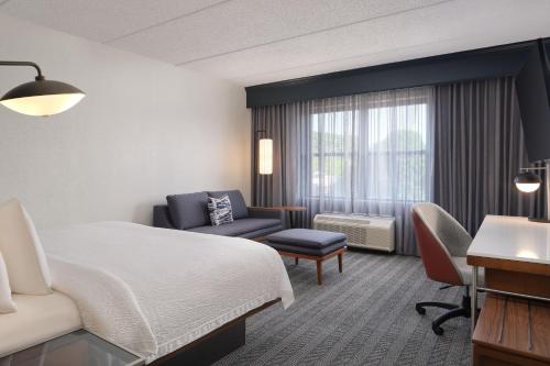 Voodi või voodid majutusasutuse Courtyard by Marriott Saratoga Springs toas