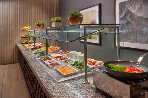 a buffet line with different types of food at The Westin Peachtree Plaza, Atlanta in Atlanta