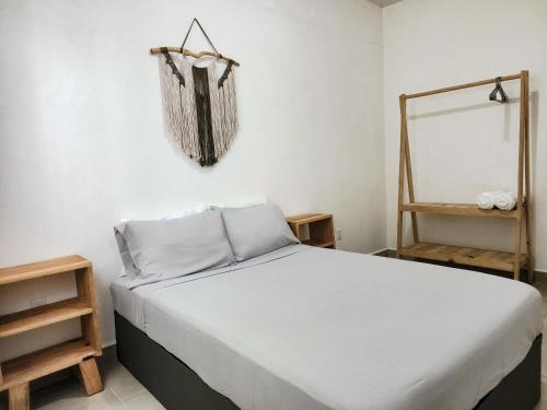 Ένα ή περισσότερα κρεβάτια σε δωμάτιο στο El Faro 2bed 1 bath gated neighborhood with pool