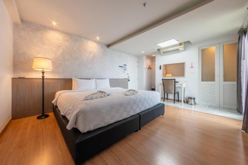 Postel nebo postele na pokoji v ubytování A.LIST HOTEL