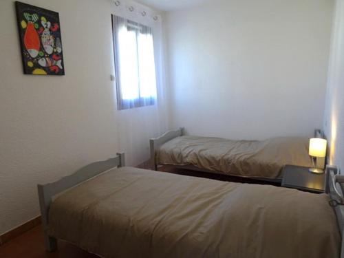 Photo de la galerie de l'établissement Appartement 3 pièces avec piscine et tennis, à 500m de la plage, climatisé, parking privé - FR-1-776-101, à Argelès-sur-Mer