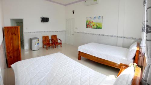 Katil atau katil-katil dalam bilik di Hung Phuc Mui Ne Hotel