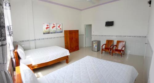 Katil atau katil-katil dalam bilik di Hung Phuc Mui Ne Hotel