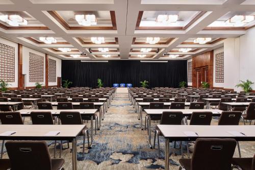 an empty banquet hall with tables and chairs at Sheraton Fiji Golf & Beach Resort in Denarau