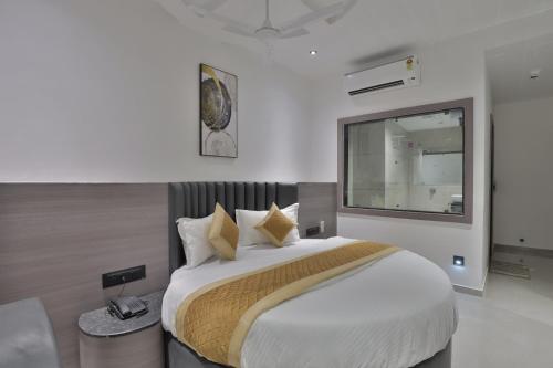 Postel nebo postele na pokoji v ubytování Hotel Legacy