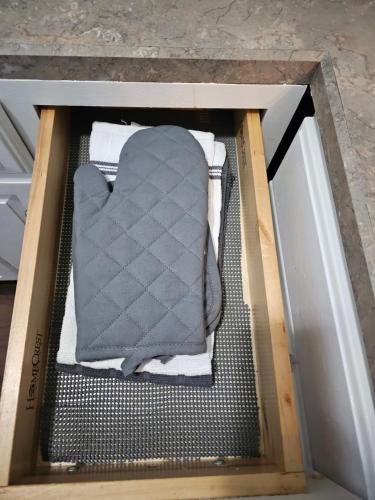 an open box with a mattress in it at Newly Renovated Historic 6-BR Manor plus 1-BR Apt, Where Timeless Elegance Meets Modern Luxury in Onancock