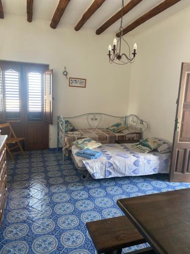 A bed or beds in a room at Casa Francesca