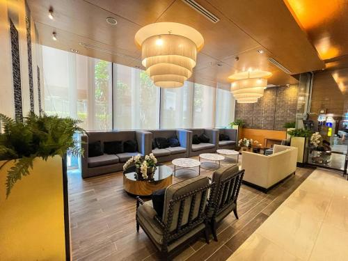 Area soggiorno di The Astra Luxury Condo in Town