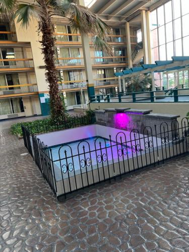 a fountain in the middle of a building at The Lodge Hotel and Banquets in Bridgeton