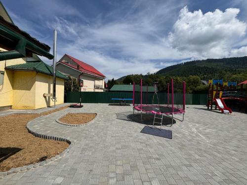 a playground with slides at Golden Lemon in Mizhhirʼʼya