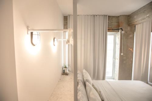 Convent Apartments - Huge One Combinationにあるベッド