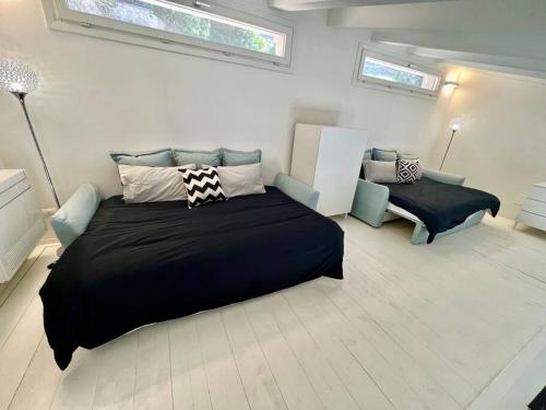Ένα ή περισσότερα κρεβάτια σε δωμάτιο στο Luxury Seafront Penthouse