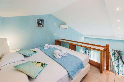 Ένα ή περισσότερα κρεβάτια σε δωμάτιο στο Dream Boutique Apartments