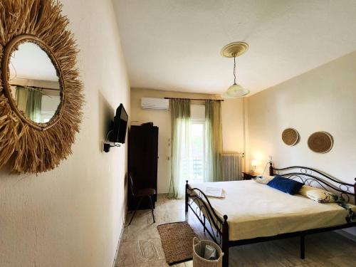 Postel nebo postele na pokoji v ubytování Aktaion Hotel