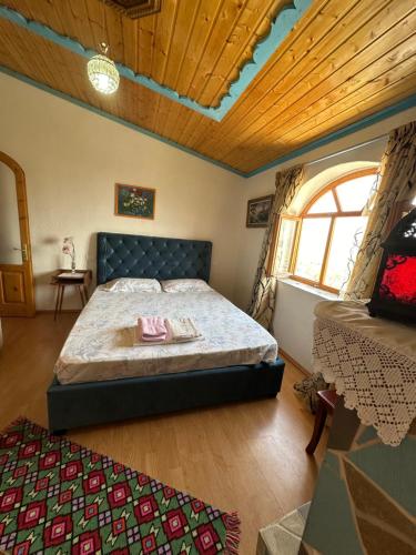 Llit o llits en una habitació de Villa Zeko