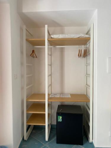 a walk in closet with bunk beds in it at Pensione La Nassa in Stromboli