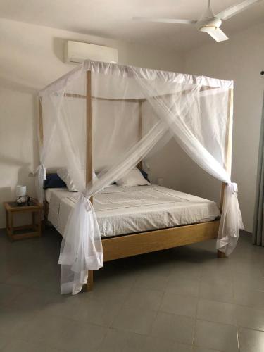 Ένα ή περισσότερα κρεβάτια σε δωμάτιο στο Villa Aloha
