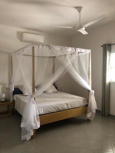 Ένα ή περισσότερα κρεβάτια σε δωμάτιο στο Villa Aloha