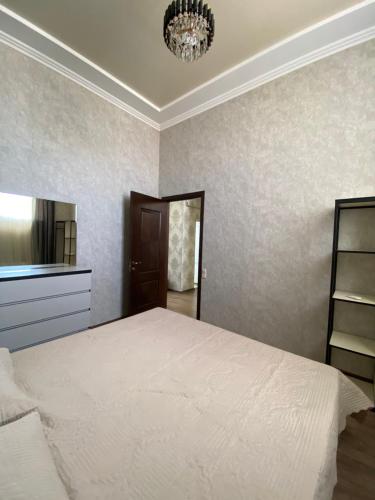 Ένα ή περισσότερα κρεβάτια σε δωμάτιο στο Apartment Atina