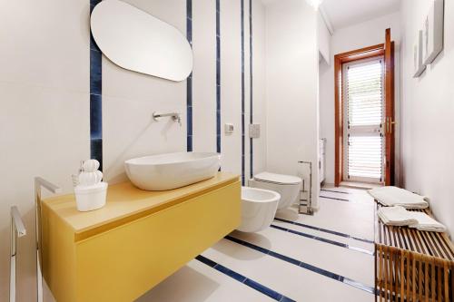Et badeværelse på Chicco di Sale - Exclusive Pool Villa
