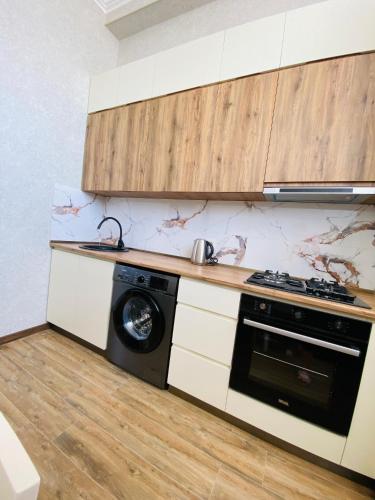 Η κουζίνα ή μικρή κουζίνα στο Apartment Atina
