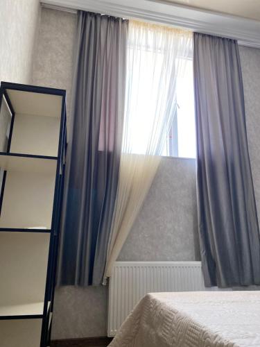 Ένα ή περισσότερα κρεβάτια σε δωμάτιο στο Apartment Atina