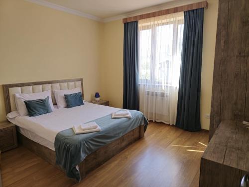 Ein Bett oder Betten in einem Zimmer der Unterkunft Zartonq