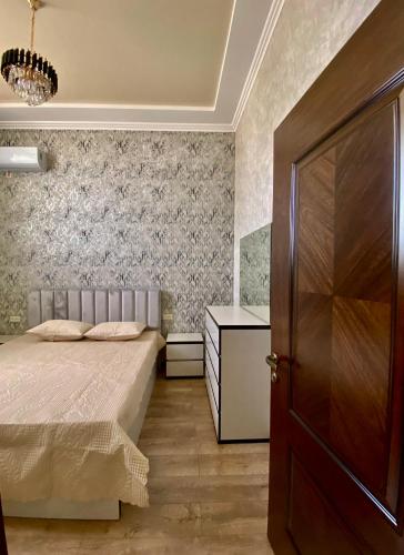 Ένα ή περισσότερα κρεβάτια σε δωμάτιο στο Apartment Atina