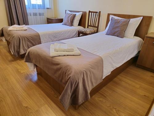 Ein Bett oder Betten in einem Zimmer der Unterkunft Zartonq