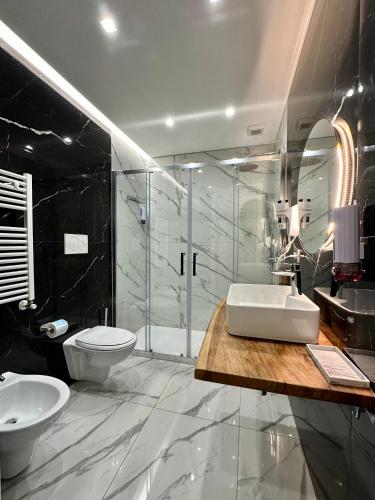 Koupelna v ubytování Oltremare Luxury Suites
